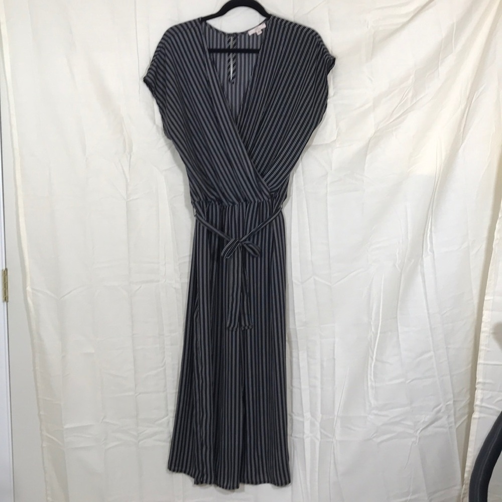 Black and white striped jumpsuit.